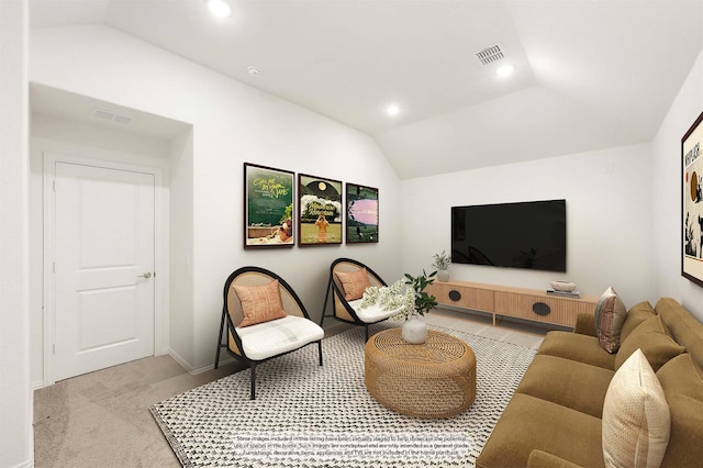 living room featuring light carpet and vaulted ceiling