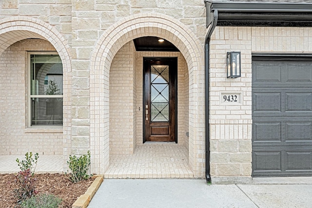 property entrance featuring a garage