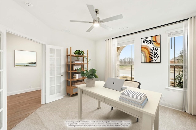 office area with ceiling fan and french doors