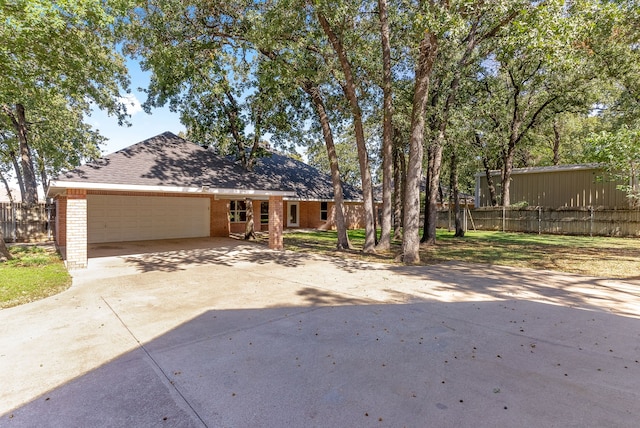 single story home featuring a garage