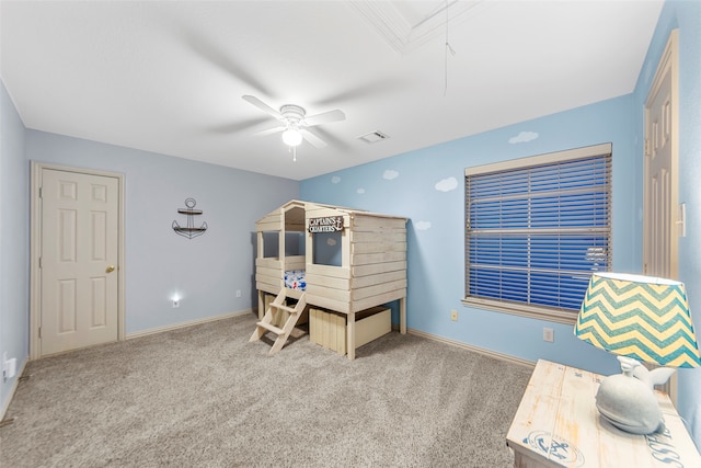 bedroom featuring light colored carpet and ceiling fan