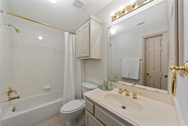 full bathroom with tile patterned flooring, vanity, shower / tub combo, and toilet