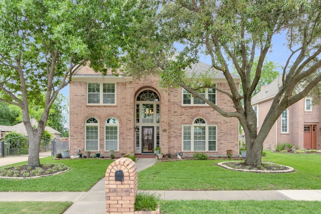 view of front of home featuring a front lawn