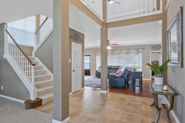 8525 Castle Creek Rd, North Richland Hills, TX 76182 - foyer featuring stairway, a ceiling fan, baseboards, and light tile patterned floors