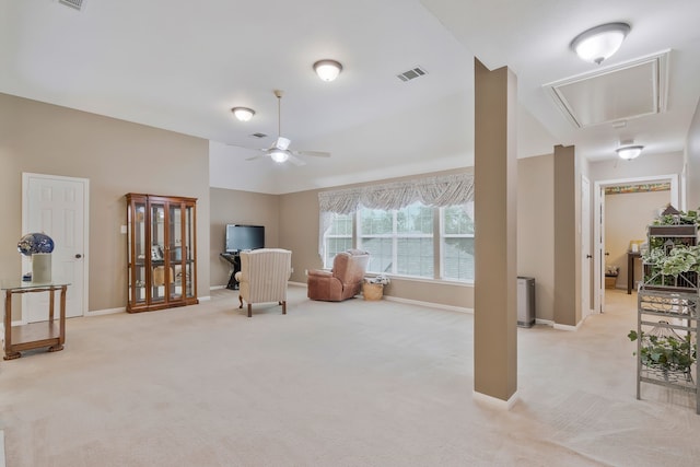 sitting room with light carpet and ceiling fan