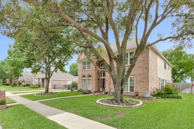 view of front facade with a front lawn