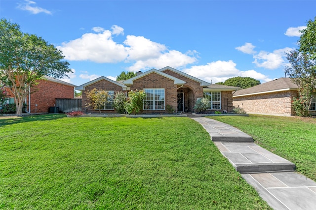 single story home featuring a front yard