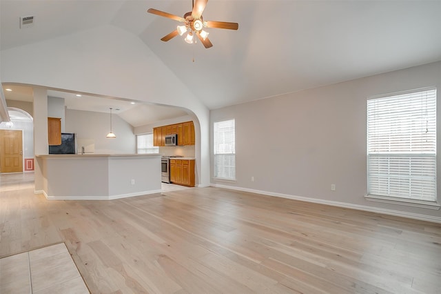 unfurnished living room featuring high vaulted ceiling, ceiling fan, and light hardwood / wood-style floors