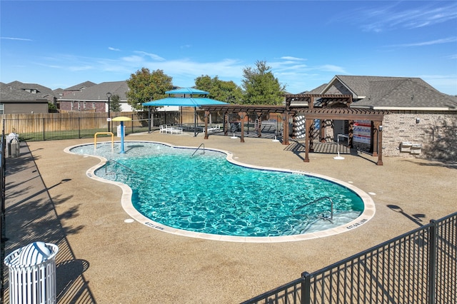 view of swimming pool with a gazebo and a patio area