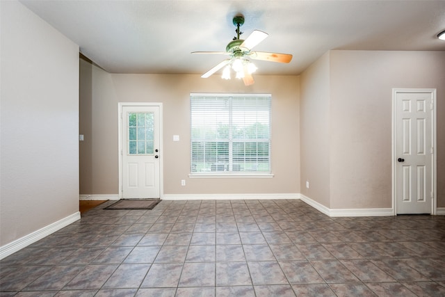 interior space featuring ceiling fan