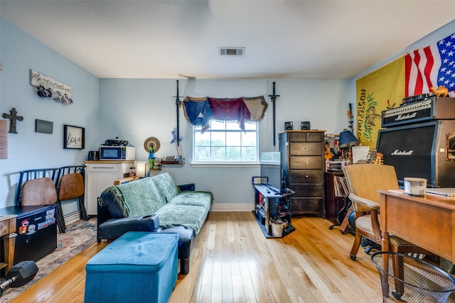 office with light wood-type flooring