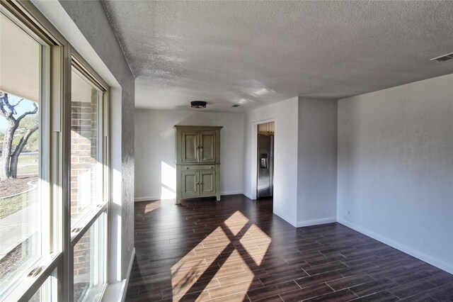 unfurnished living room featuring ceiling fan, a brick fireplace, built in features, french doors, and dark hardwood / wood-style flooring