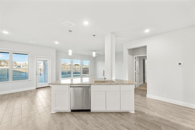 kitchen with white cabinetry, sink, decorative light fixtures, and dishwasher