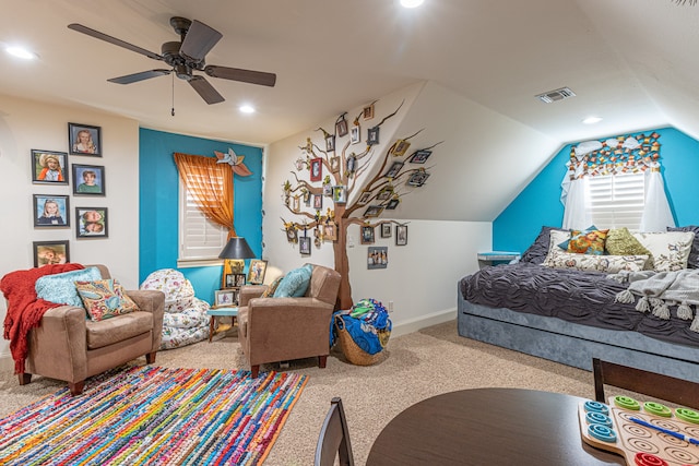 bedroom featuring ceiling fan, carpet floors, and lofted ceiling