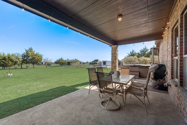 view of patio with outdoor dining area