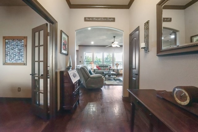 hallway featuring crown molding and dark hardwood / wood-style floors