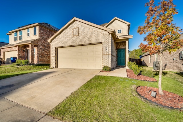 front of property with a front yard and a garage