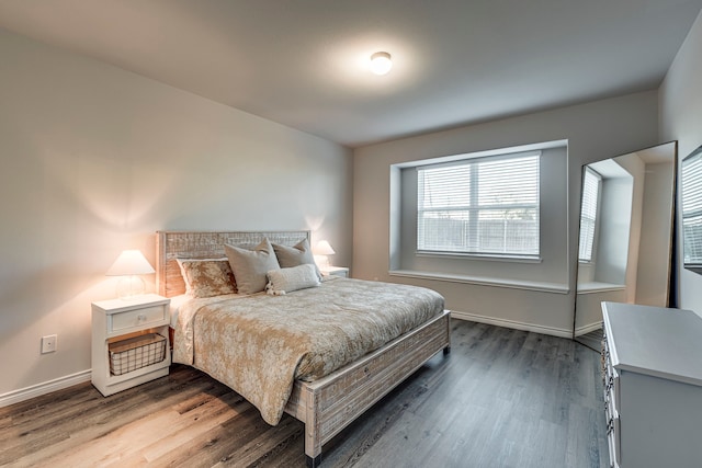 bedroom featuring hardwood / wood-style flooring