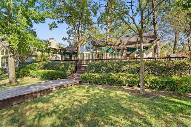 view of yard with a wooden deck