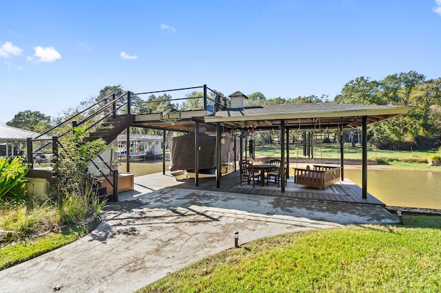 view of patio with a boat dock