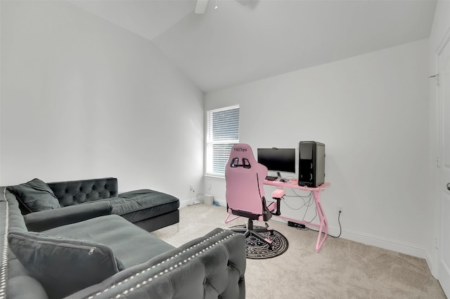 carpeted office featuring ceiling fan and lofted ceiling