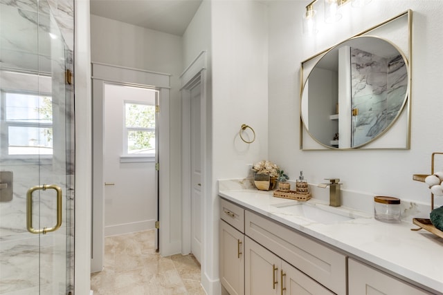 bathroom with vanity and walk in shower