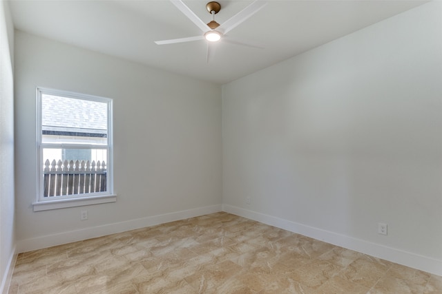 unfurnished room with ceiling fan