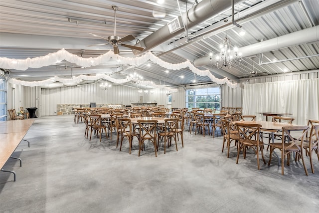 dining room with ceiling fan and concrete floors