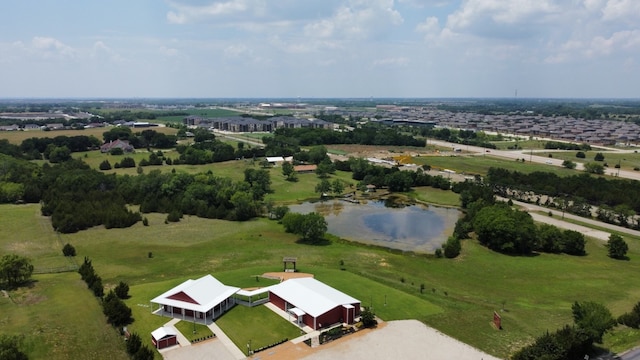 bird's eye view with a water view and a rural view