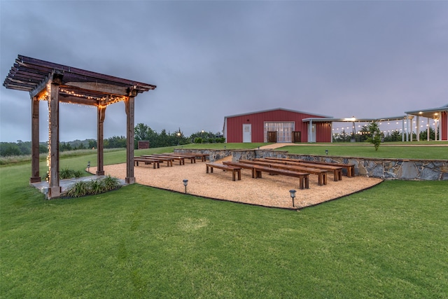 view of play area featuring a yard and an outdoor structure