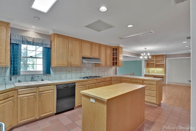 kitchen with dishwasher, sink, hanging light fixtures, a kitchen island, and ornamental molding