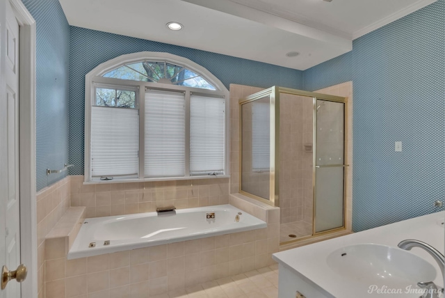 bathroom with vanity and a shower with door