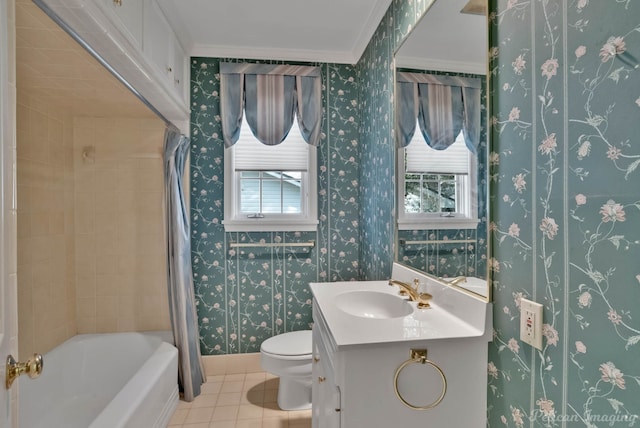 bathroom with toilet, crown molding, a healthy amount of sunlight, and tile patterned floors