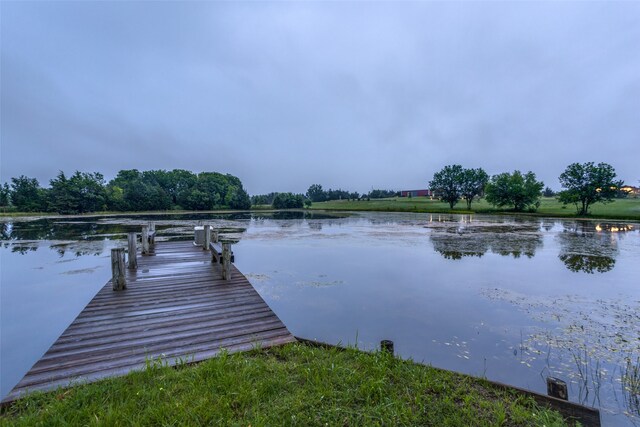 view of dock with a water view