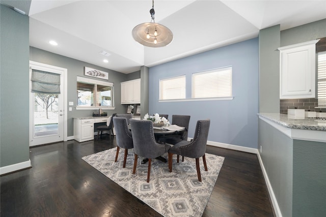 bedroom with light carpet, a tray ceiling, and ceiling fan