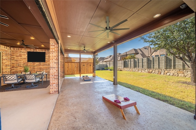 view of patio featuring ceiling fan