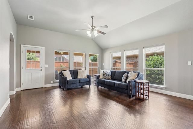 living room featuring vaulted ceiling, ceiling fan, and dark hardwood / wood-style floors