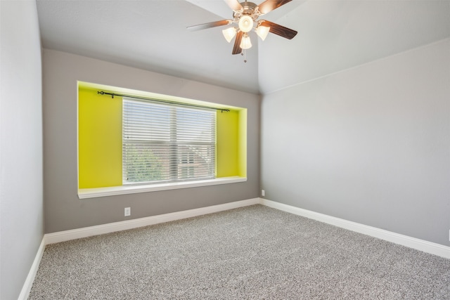 spare room with carpet floors and ceiling fan