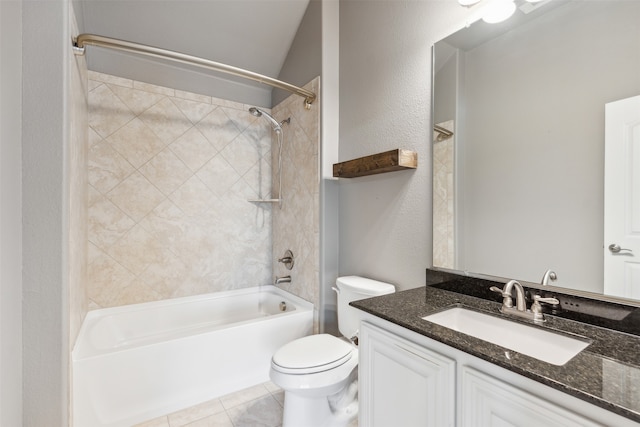 full bathroom with toilet, vanity, tile patterned floors, and tiled shower / bath combo