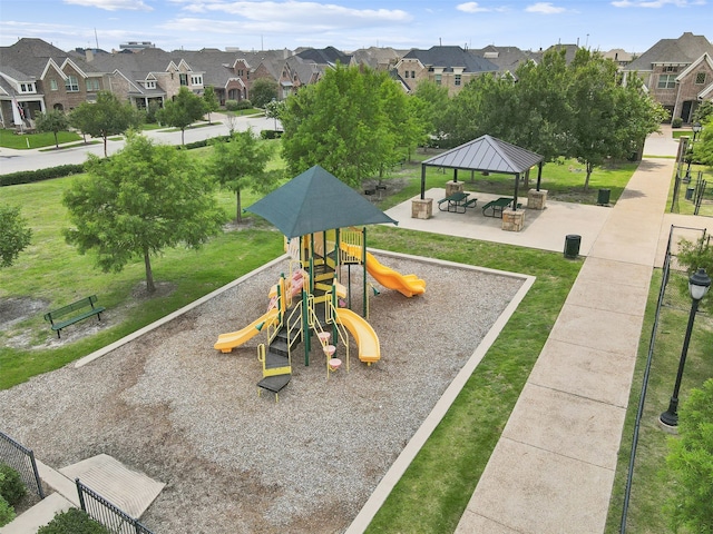 view of playground featuring a gazebo and a yard