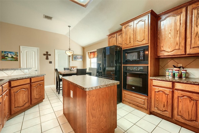 kitchen with a center island, vaulted ceiling, decorative backsplash, light tile patterned floors, and black appliances