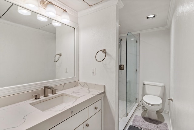 bathroom featuring crown molding, vanity, a shower with shower door, and toilet