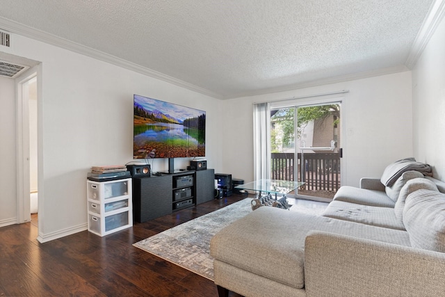 living room with ornamental molding, dark hardwood / wood-style floors, and a textured ceiling