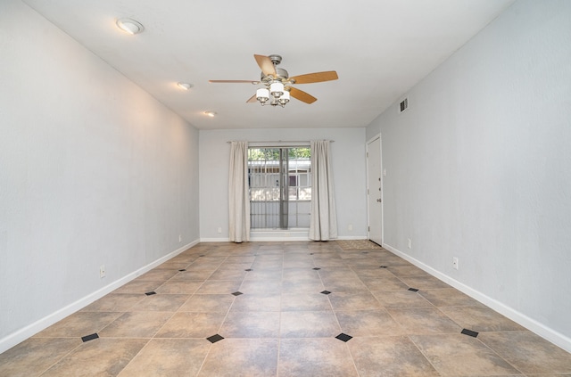 spare room featuring ceiling fan