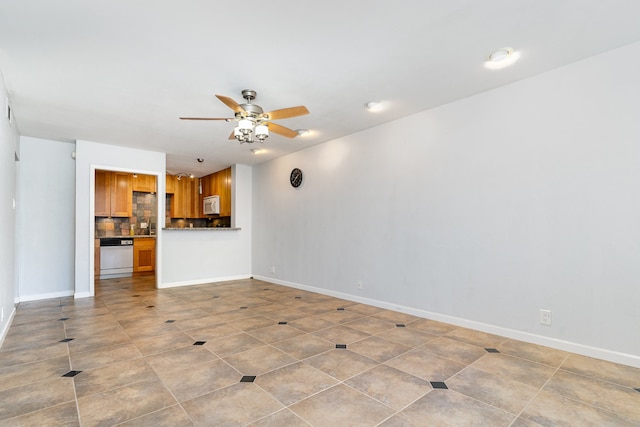 unfurnished living room with light tile patterned floors and ceiling fan