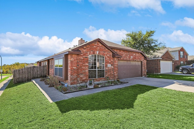 view of front of home featuring a garage and a front yard