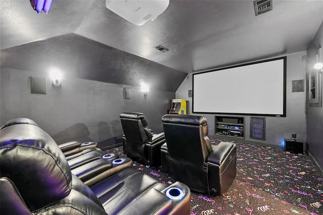 home theater with carpet flooring and lofted ceiling