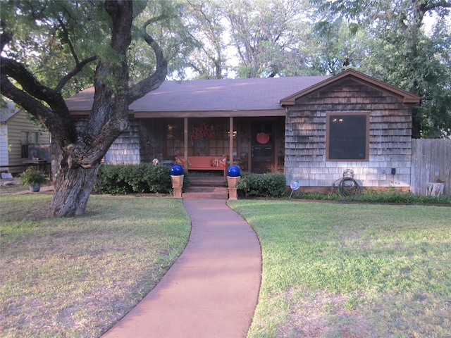 ranch-style house with a front yard