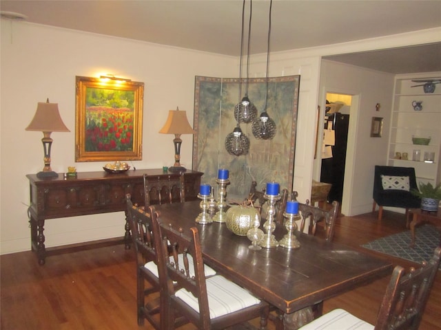 dining area with dark hardwood / wood-style floors