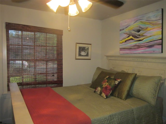 bedroom featuring ceiling fan